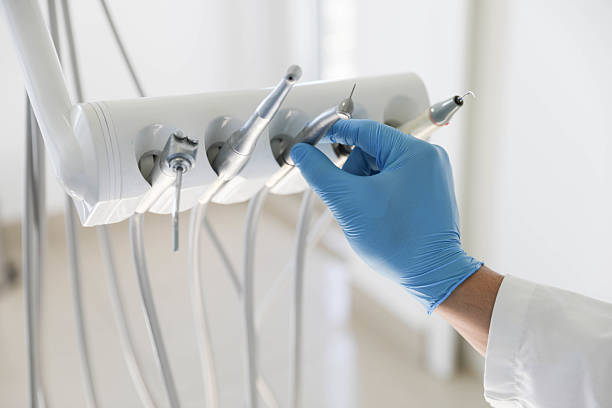 Professional Tooth Extraction technician working in Palm Beach County County, FL